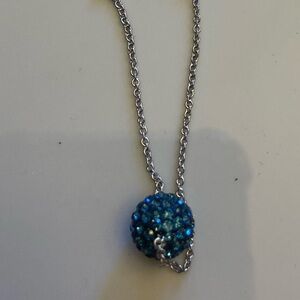 Touchstone Crystal blue birthstone necklace.